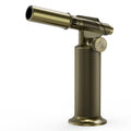 Gold metal butane micro torch with circular base and black textured grip