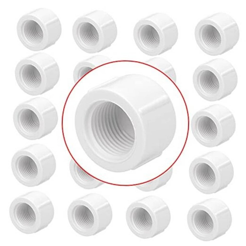 White PVC 1/2 inch female threaded pipe end cap, cylindrical with interior threads