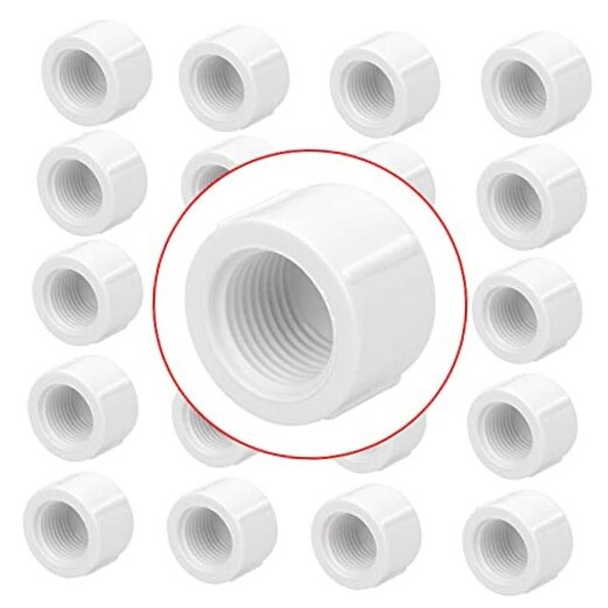 White PVC 1/2 inch female threaded pipe end cap, cylindrical with interior threads