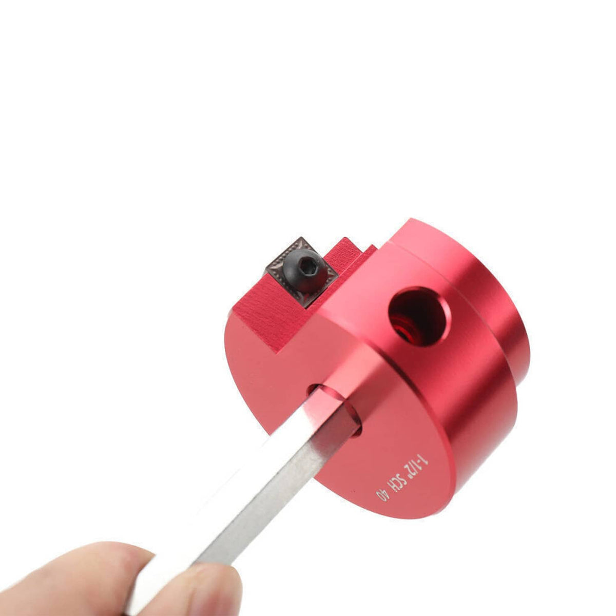 Pipe fitting reamer tool with red circular head and metal cutting shank