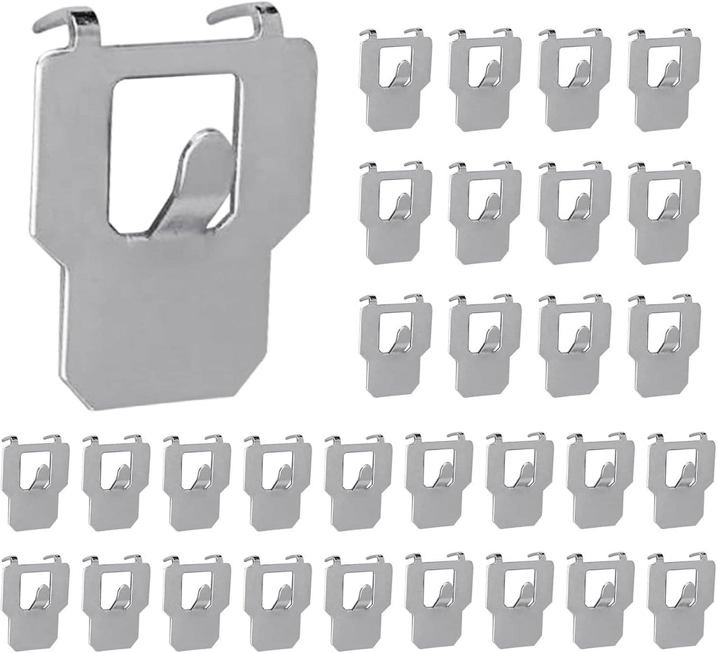 Assorted layout of silver metal claw drywall picture hangers for wall mounting
