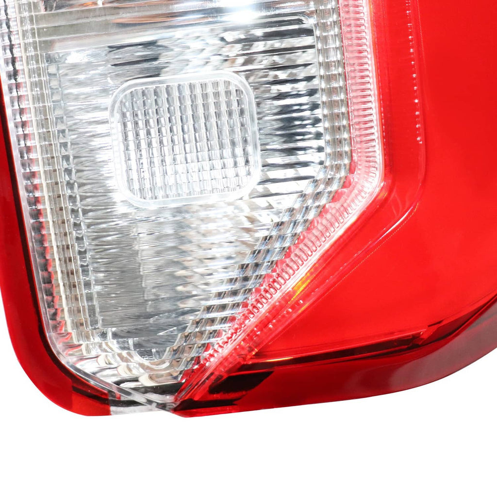 Right rear LED tail light close-up of clear lens with red LED border