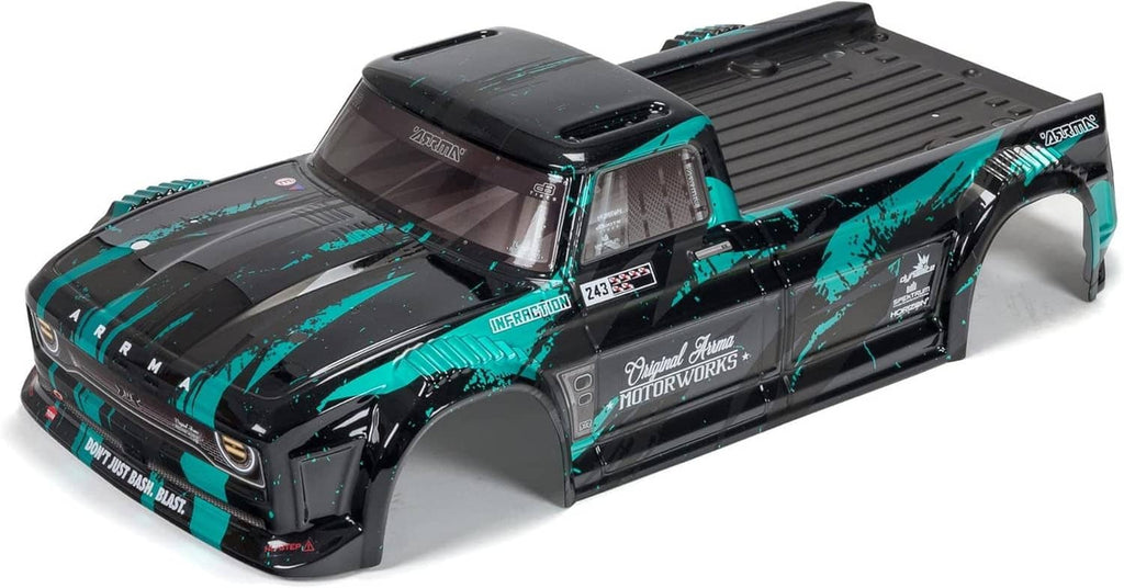 1/8 scale RC buggy angled view showing black/teal body panels and chunky off-road tires
