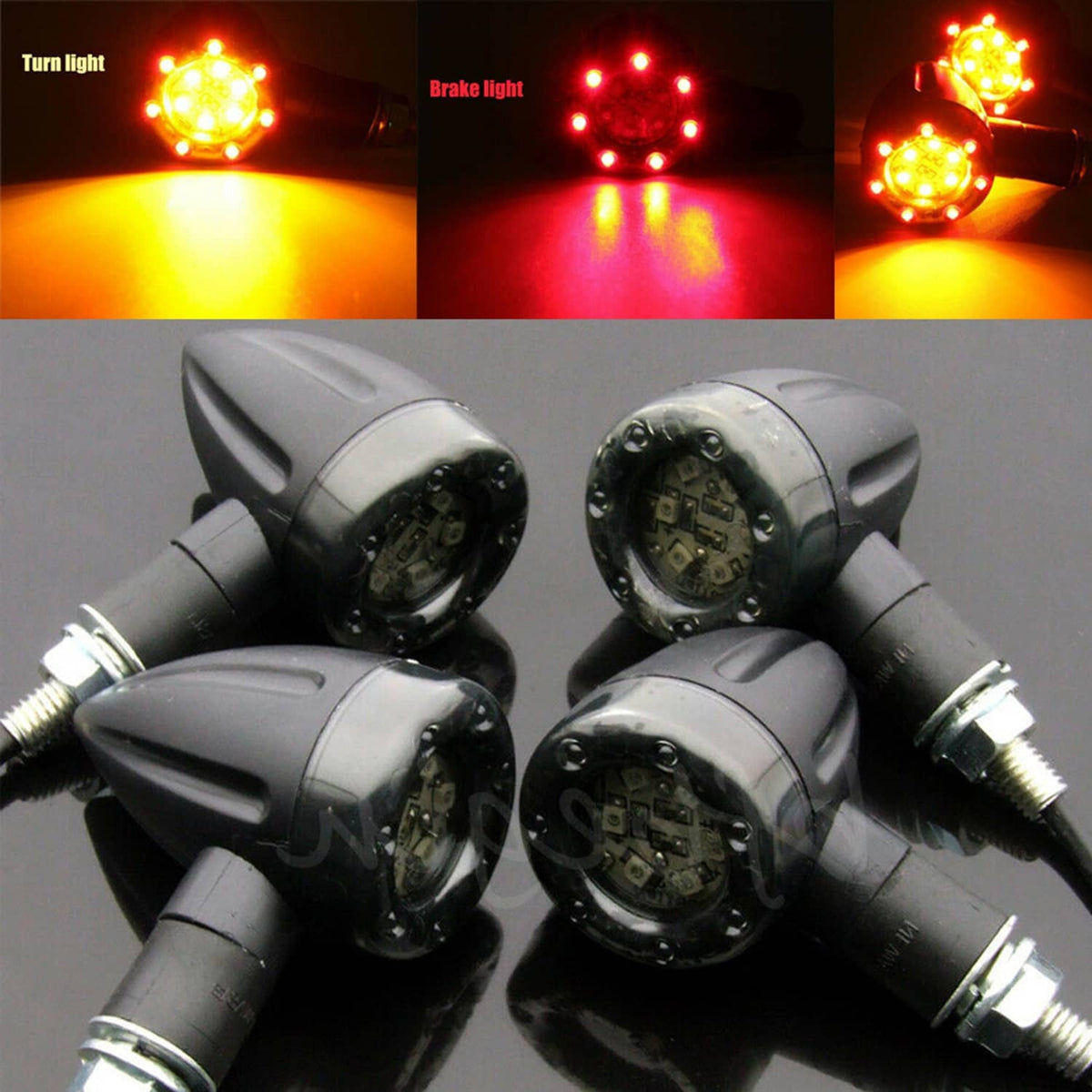 4 motorcycle LED signal lights, black housings illuminated red and amber for turn/brake