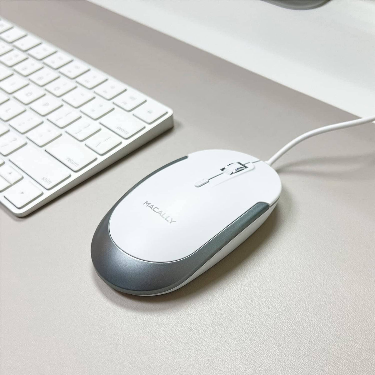 Wired computer mouse, white and gray slim body with USB cable attached