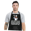 Black kitchen apron with chef graphic and slogan, adjustable neck, front pocket.