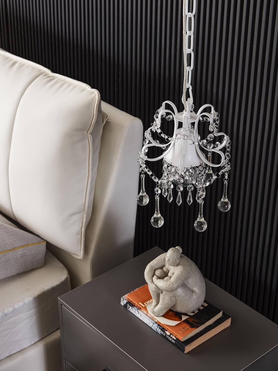 White crystal chandelier pendant light with ornate crown and dangling crystal drops