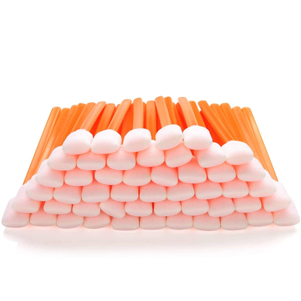 Orange foam cleaning swabs with white rectangular foam tips, neatly stacked.