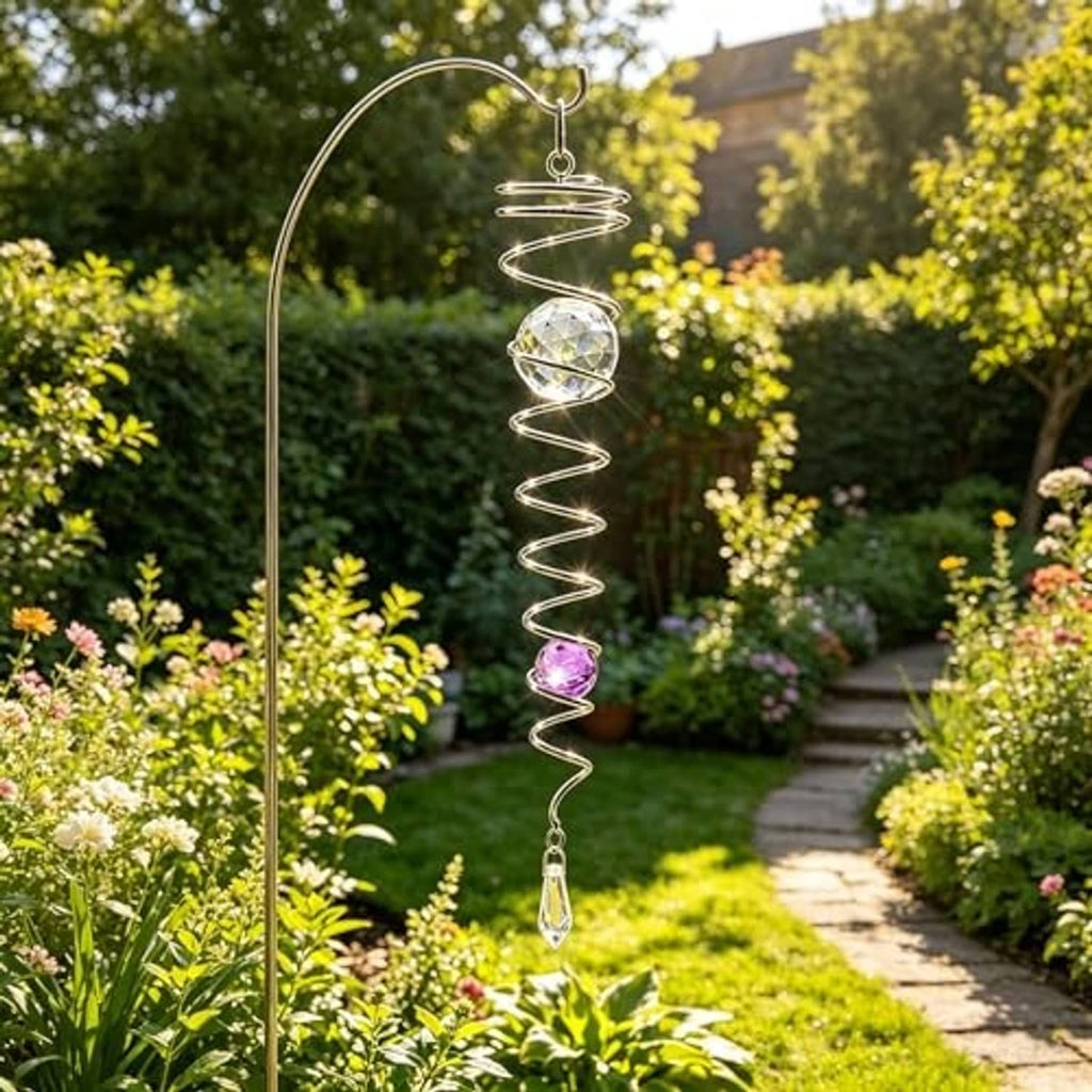 Silver spiral wind spinner with clear gazing ball, purple bead, and hanging crystal teardrop