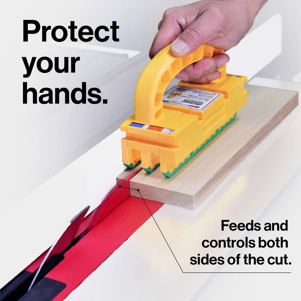 Yellow router push block held above wood board with green toothed guard