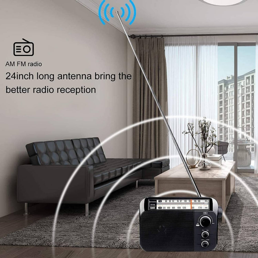 Portable AM/FM radio with extended antenna, shown on a table in a living room