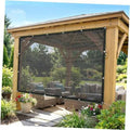 Black HDPE shade cloth panel with metal grommets on a pergola frame