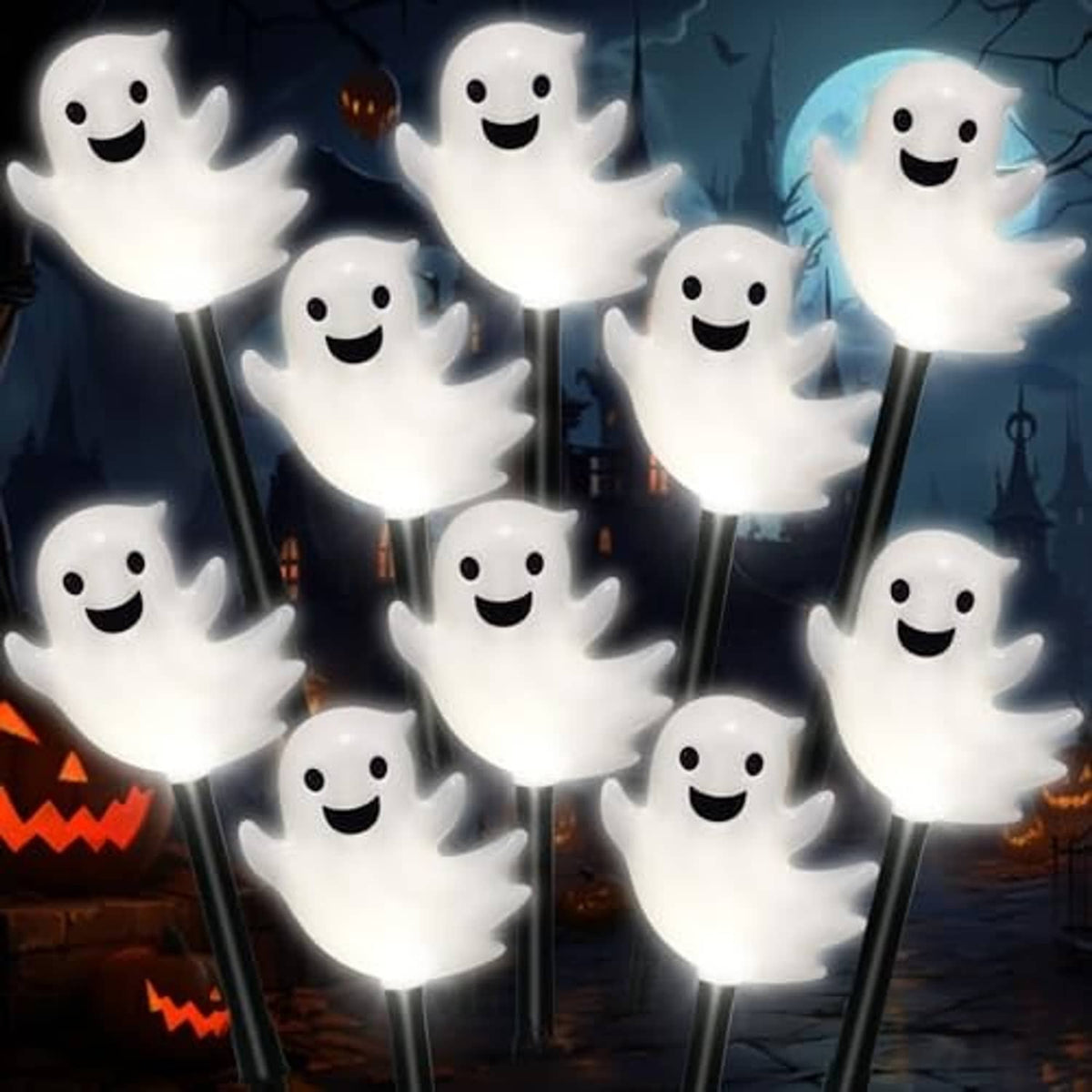 Multiple glowing white ghost-shaped solar stake lights with smiling faces