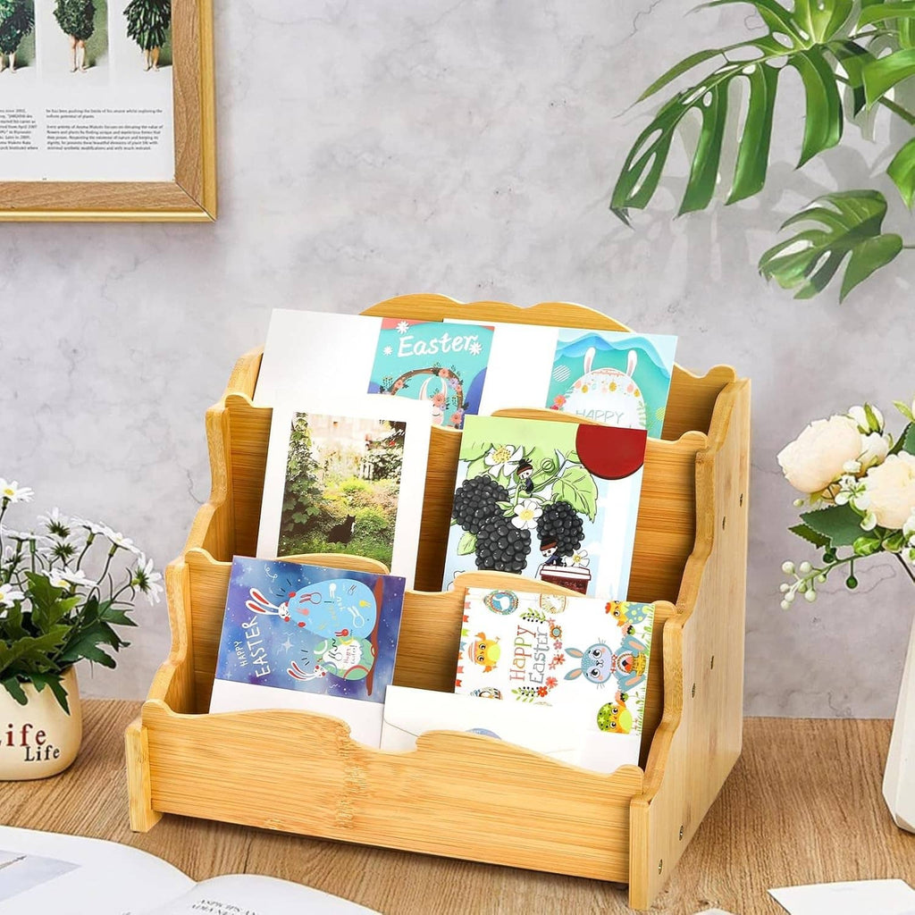 Bamboo 3-tier greeting card holder displaying colorful greeting cards