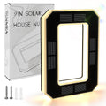 Solar house number light, black frame with glowing white digit 9