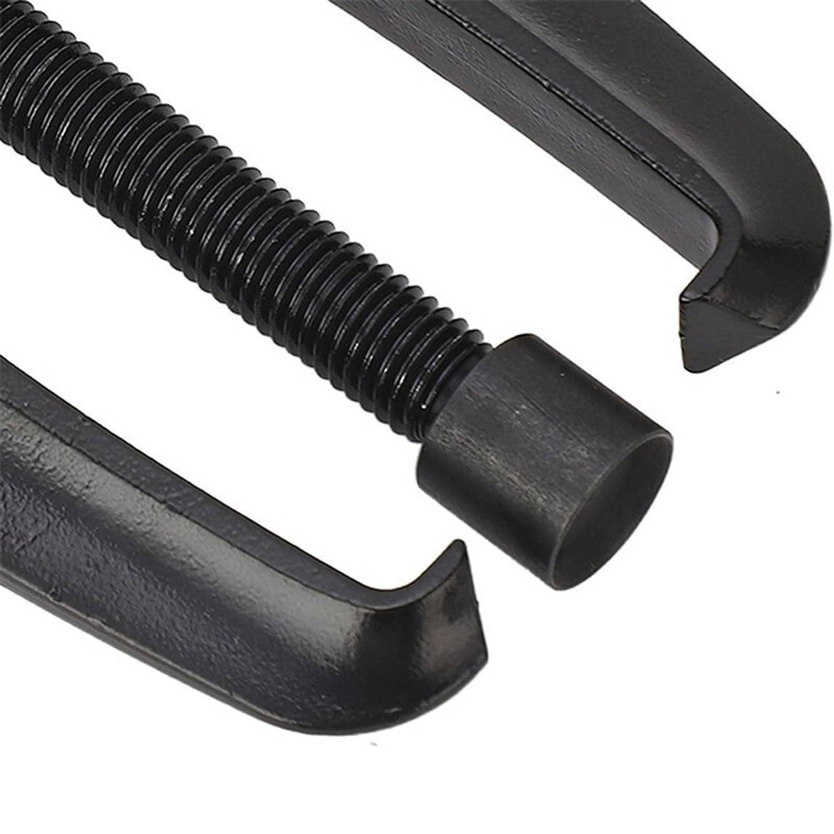 Close-up view of black puller jaws and threaded rod with textured end cap