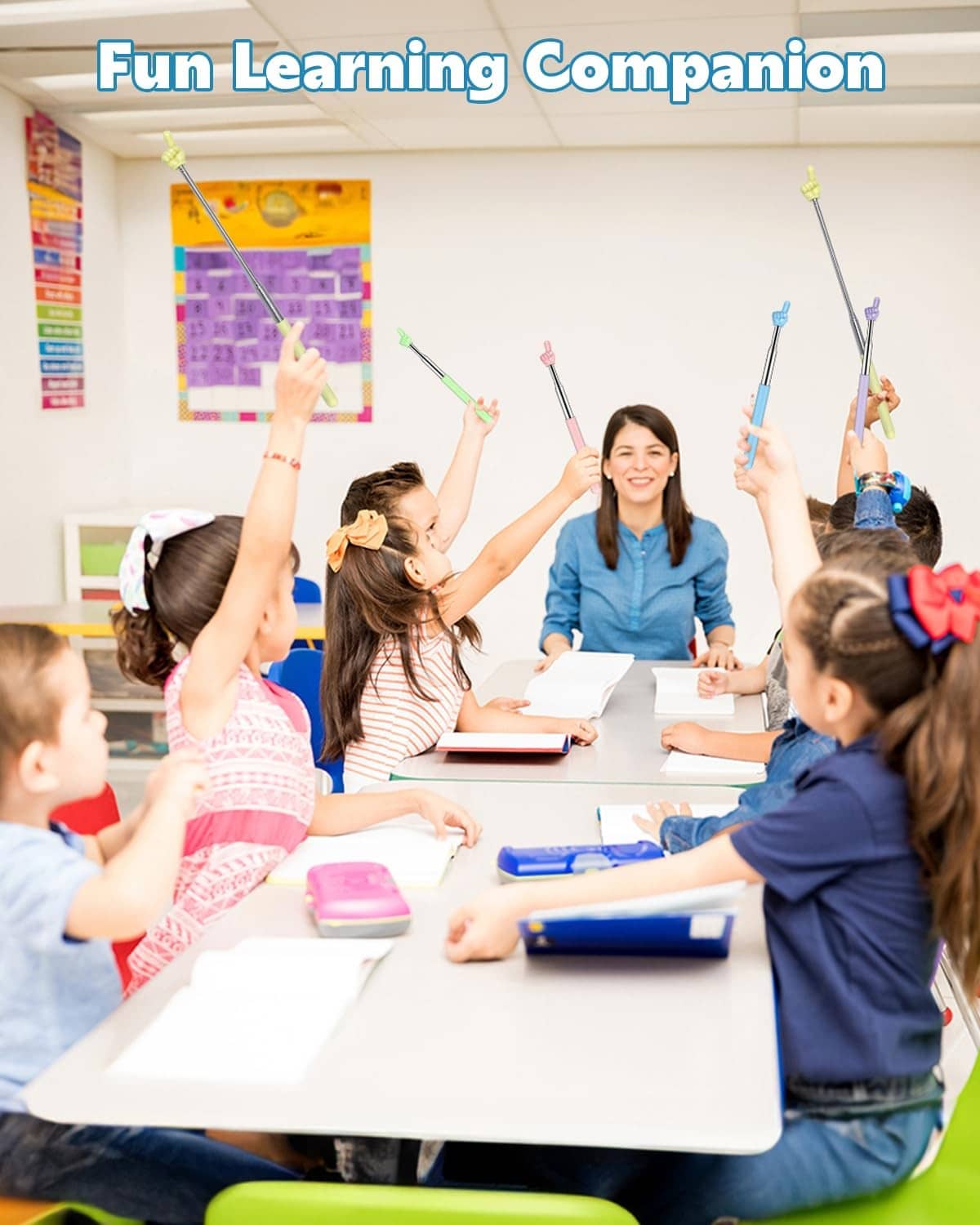 Retractable pointer held by students in a classroom learning session
