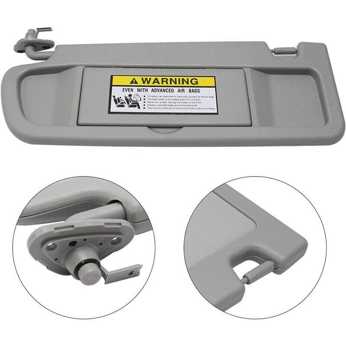 Light gray sun visor with warning label and installation hardware shown