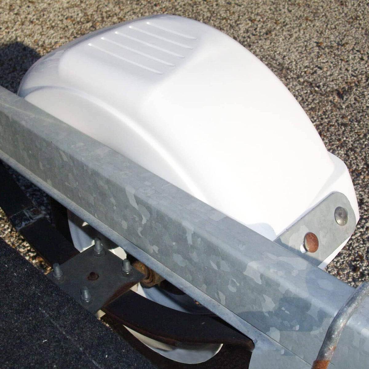 White trailer fender with vented top texture and side mounting bracket