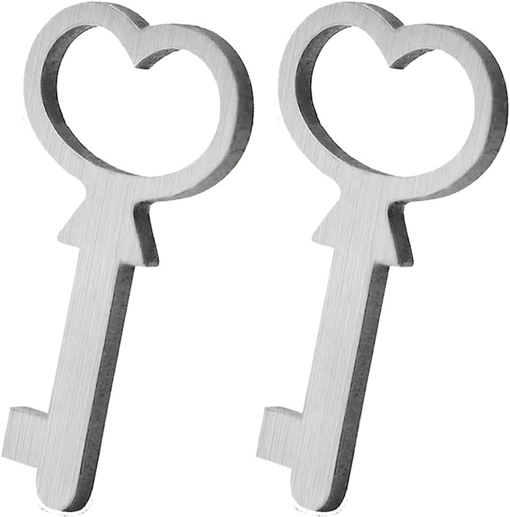Pair of silver metal replacement keys with heart-shaped key heads
