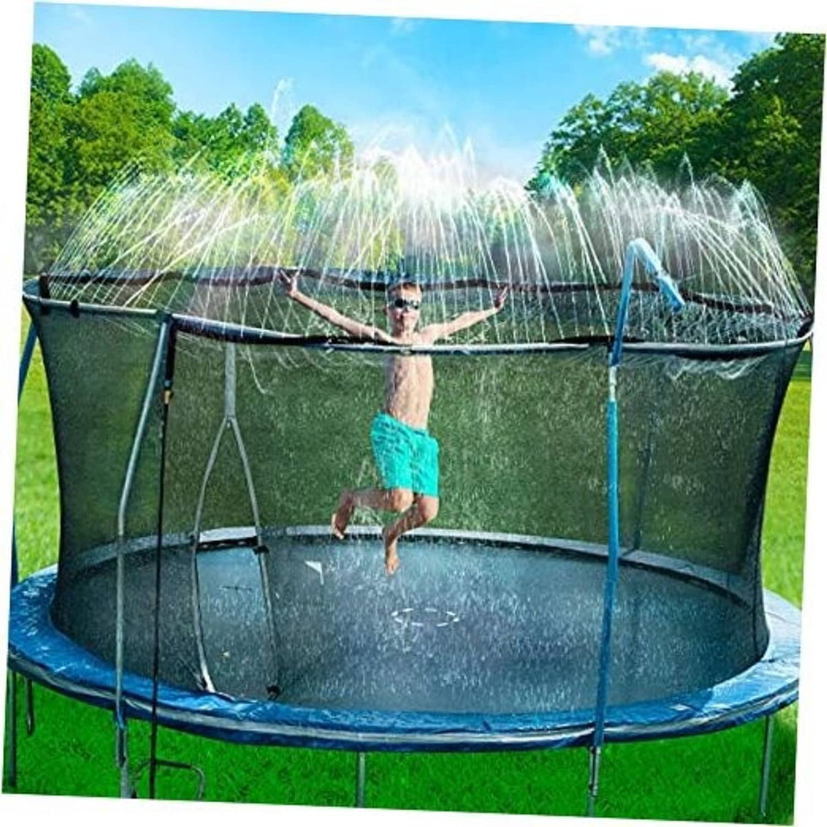 Black trampoline with multi-jet sprinkler spraying water across the jumping surface