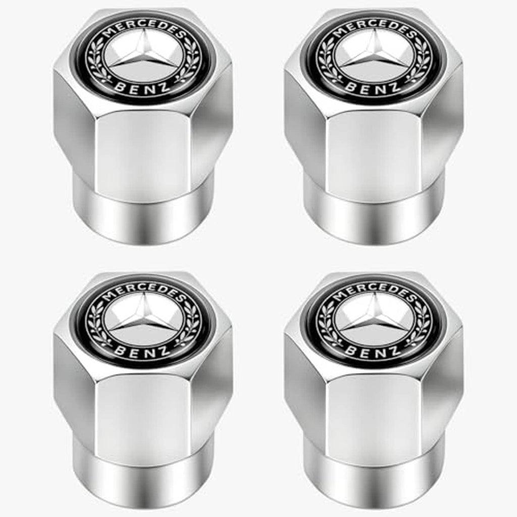Set of silver tire valve stem caps with Mercedes-Benz emblem and black outer ring