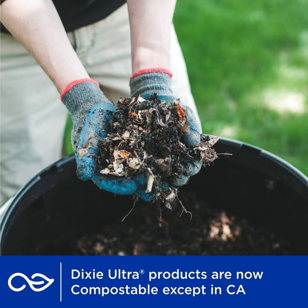Gloved hand composting food in a dark bin; Dixie Ultra compostable banner shown