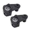 Black pivot handlebar clamp risers with circular center openings and bracket arms