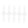 Five clear plastic straight hose barb connectors