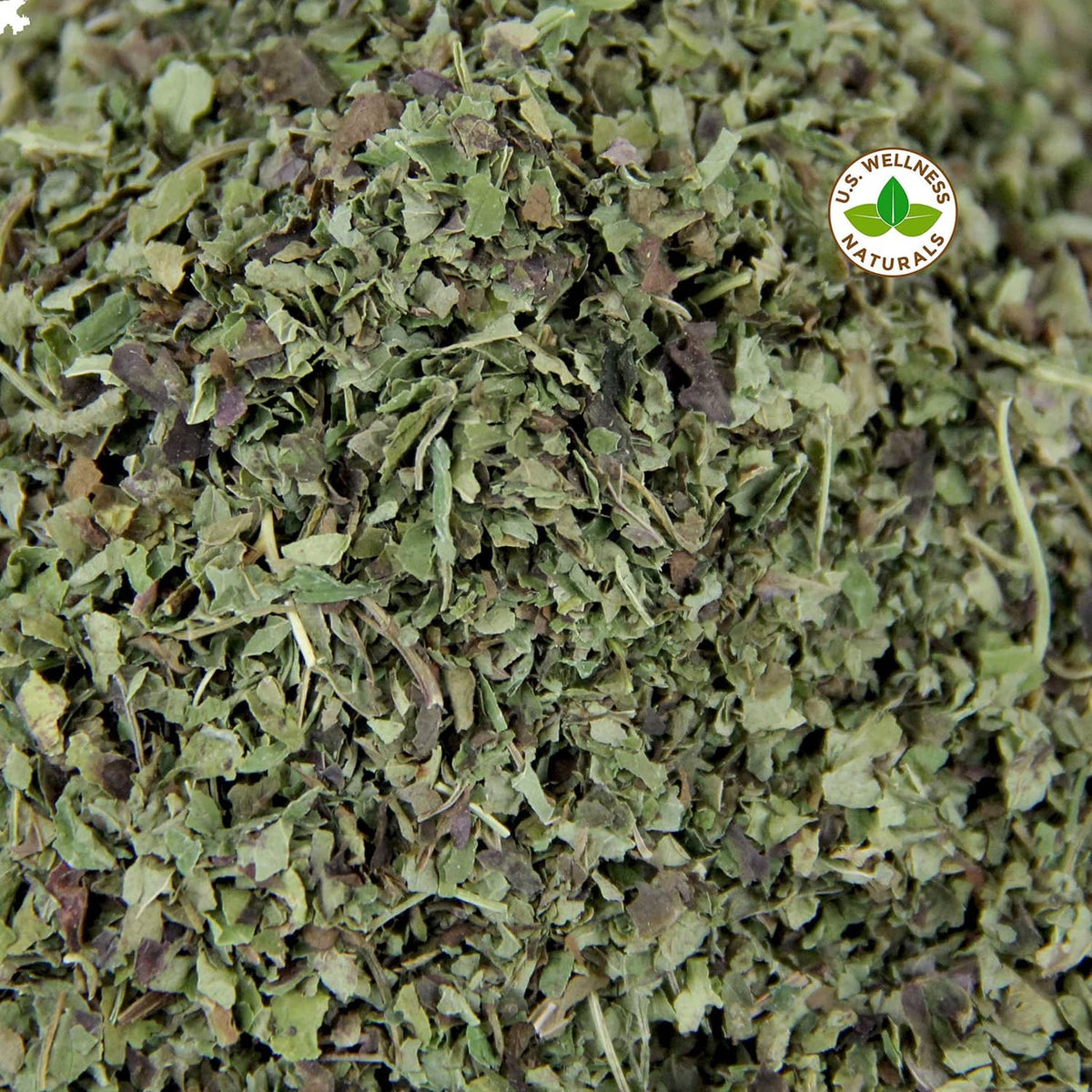 Close-up of dried lemon balm leaves with wellness seal