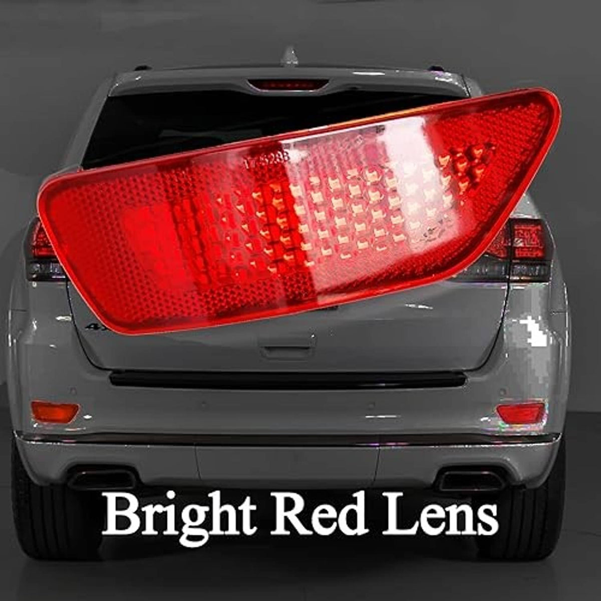 Left rear reflector lens with red textured surface and rounded housing