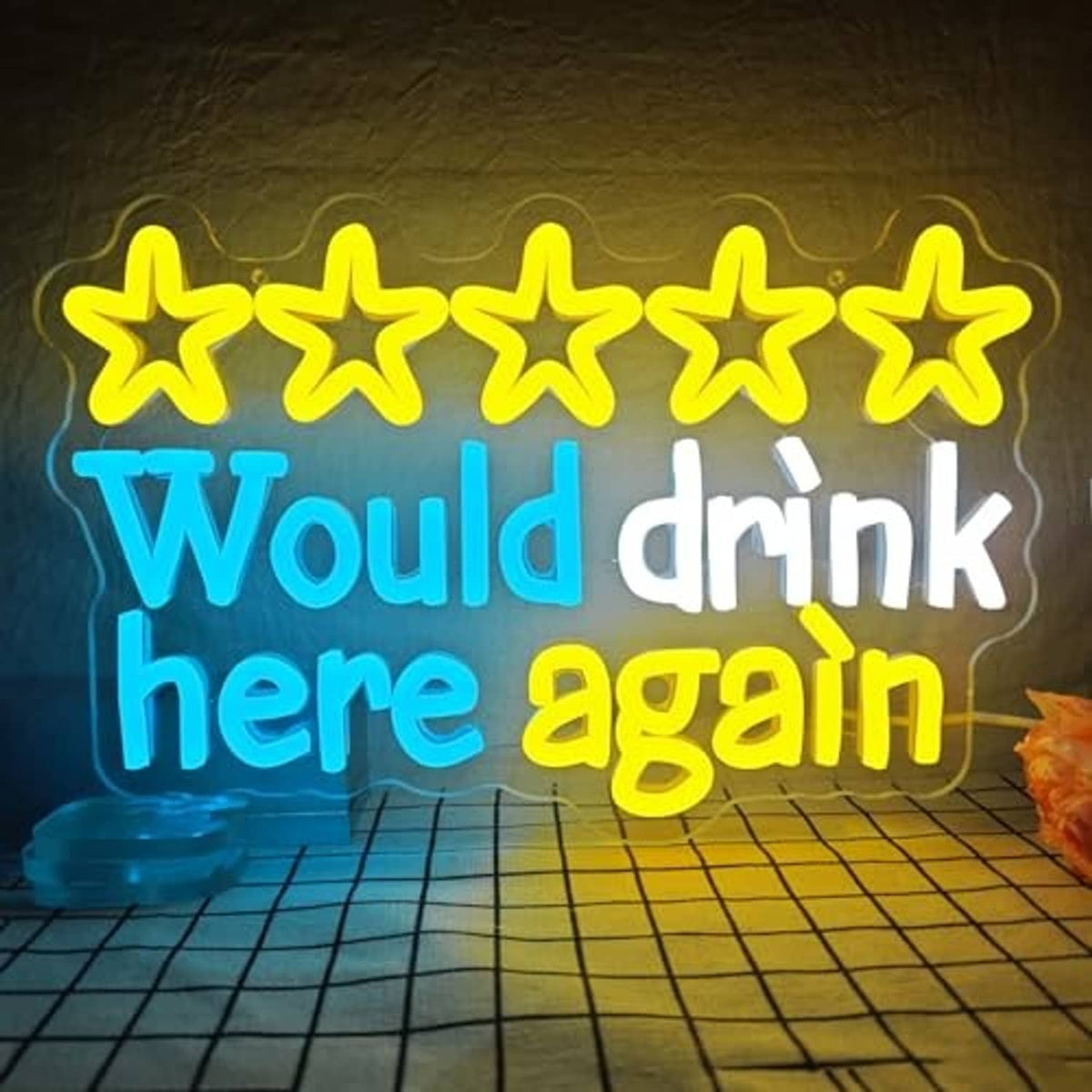 Neon drink-themed wall sign with five stars and text “Would drink here again” in blue, yellow, and orange.