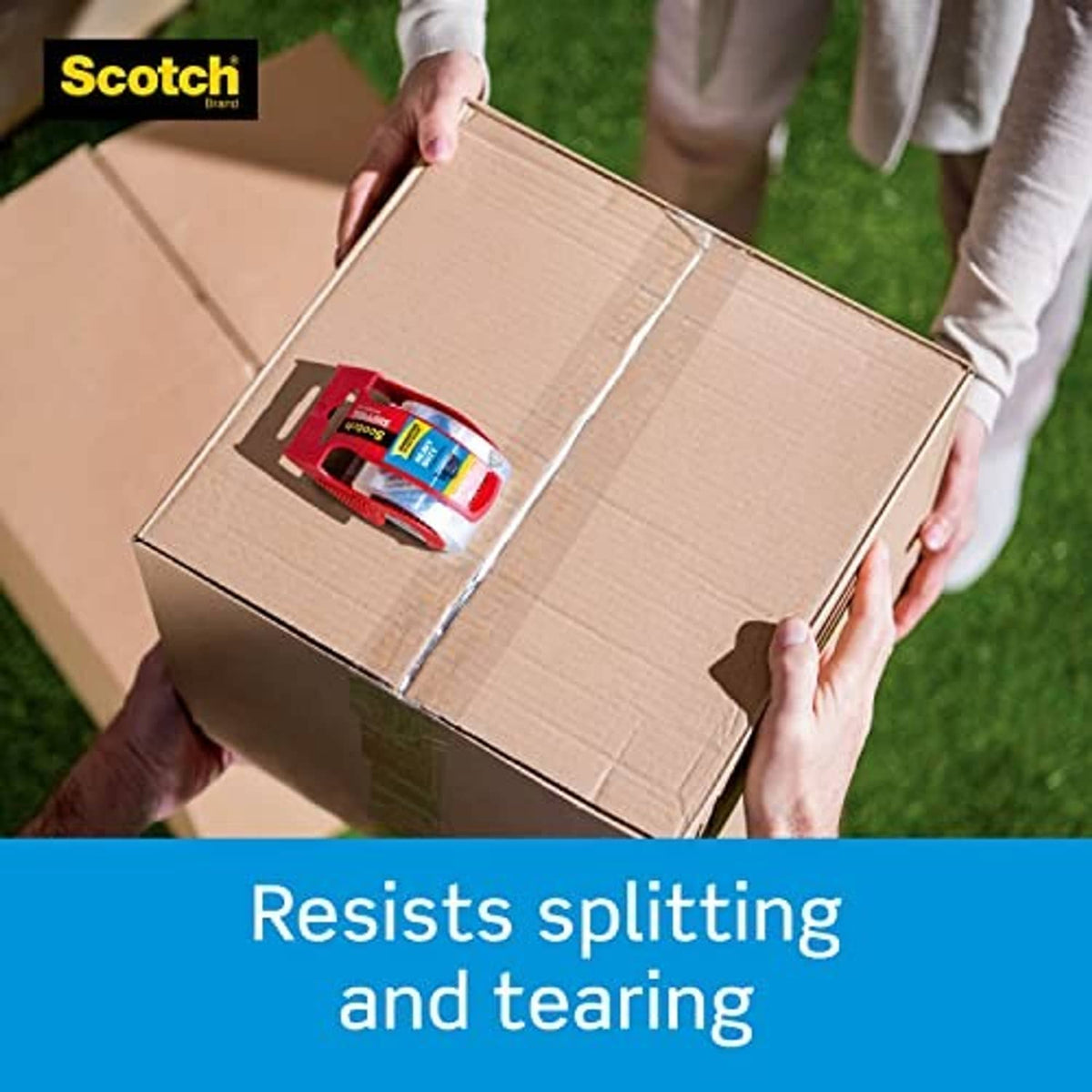 Scotch heavy-duty tape dispenser sealing a cardboard shipping box