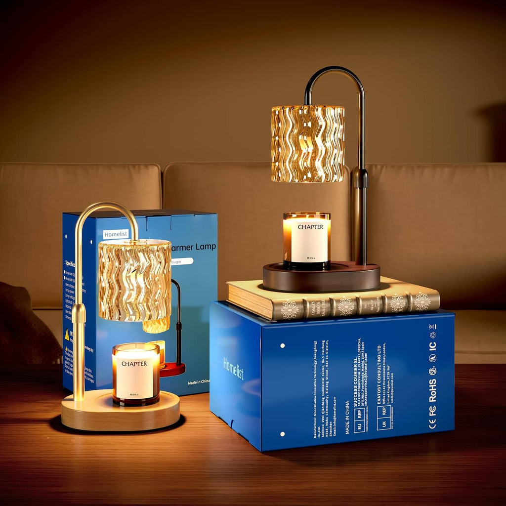 Black candle warmer lamp with glowing lantern shade beside jar candle and product box