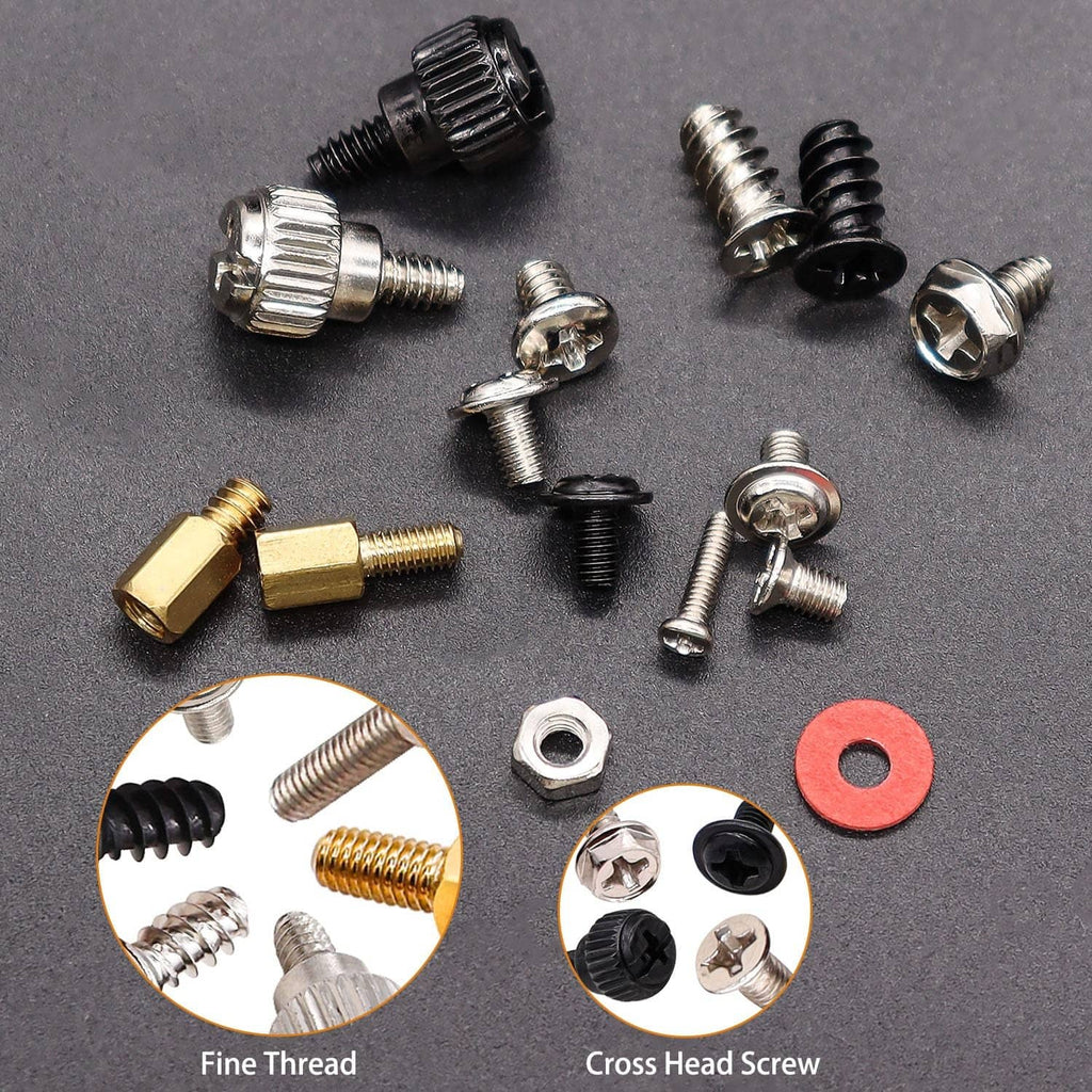 Close-up of mixed computer screws, nuts, washers, and red insulating washers