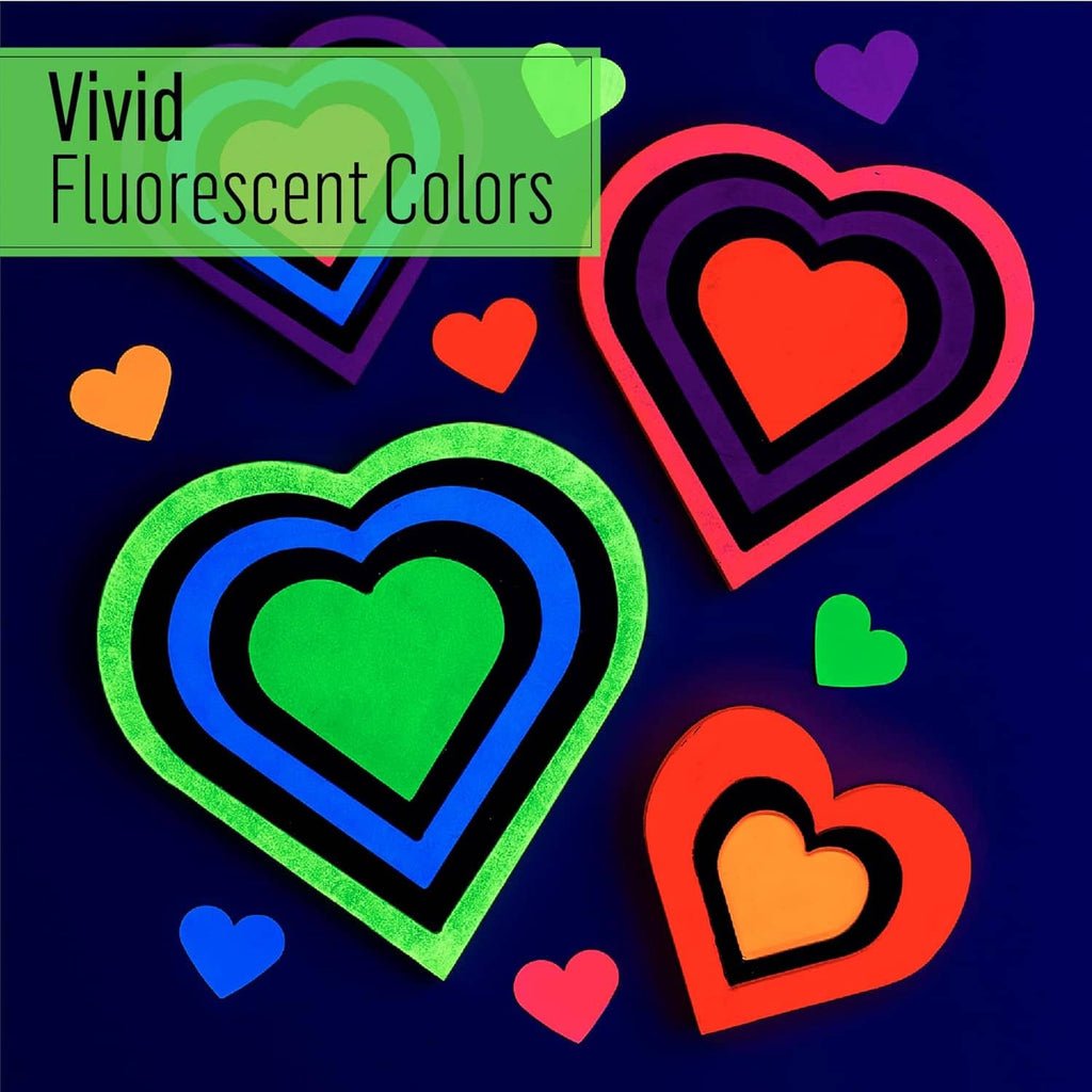 Vibrant neon glow heart shapes with fluorescent color outlines