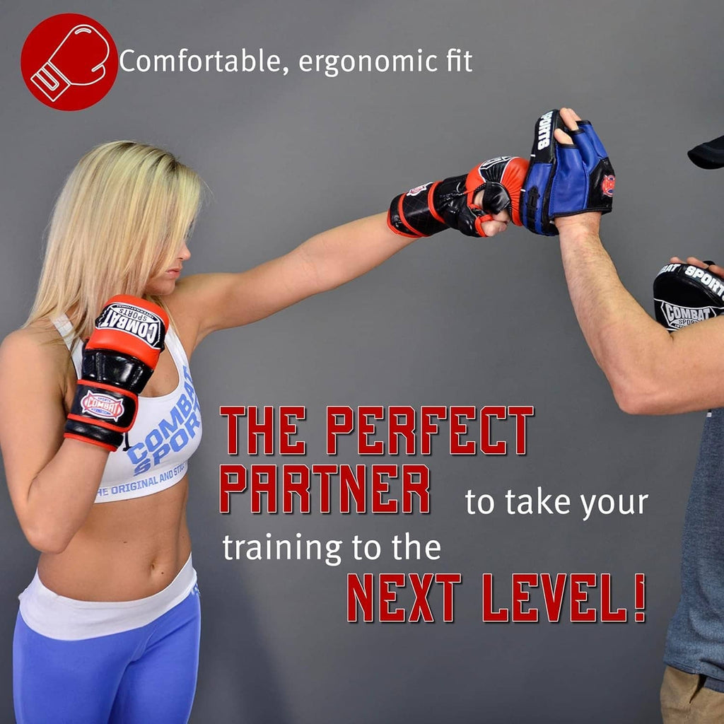 White and black MMA training gloves with hook-and-loop wrist closure on model.