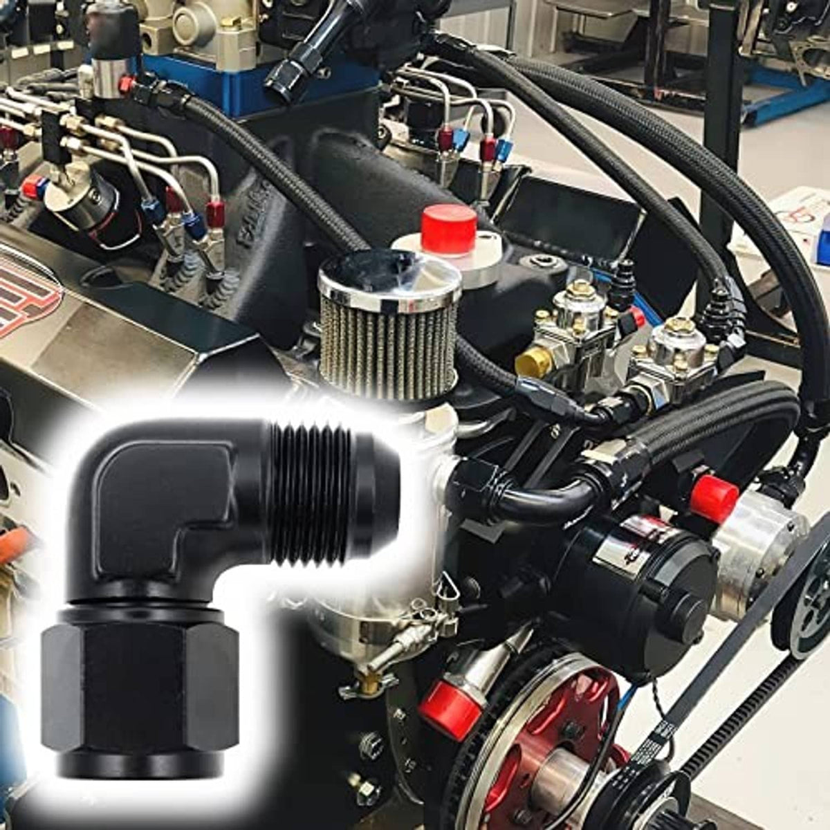 Black 90-degree AN flare swivel fitting installed in engine hose system