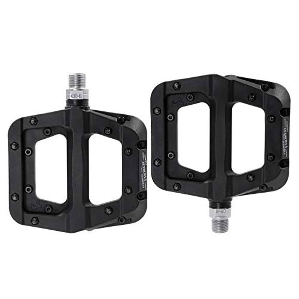 Pair of black MTB flat pedals with threaded axles and textured grip surfaces