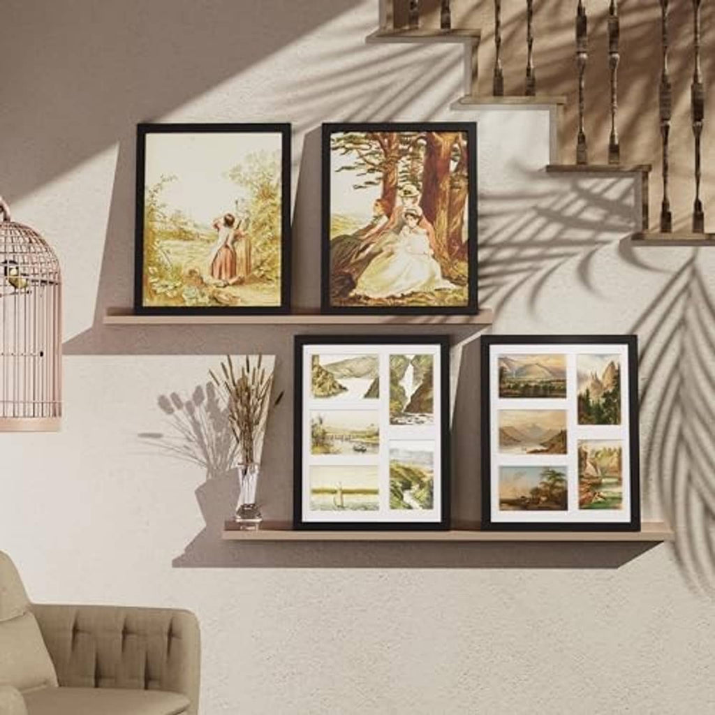 Black collage picture frame displaying several landscape photo prints on a shelf