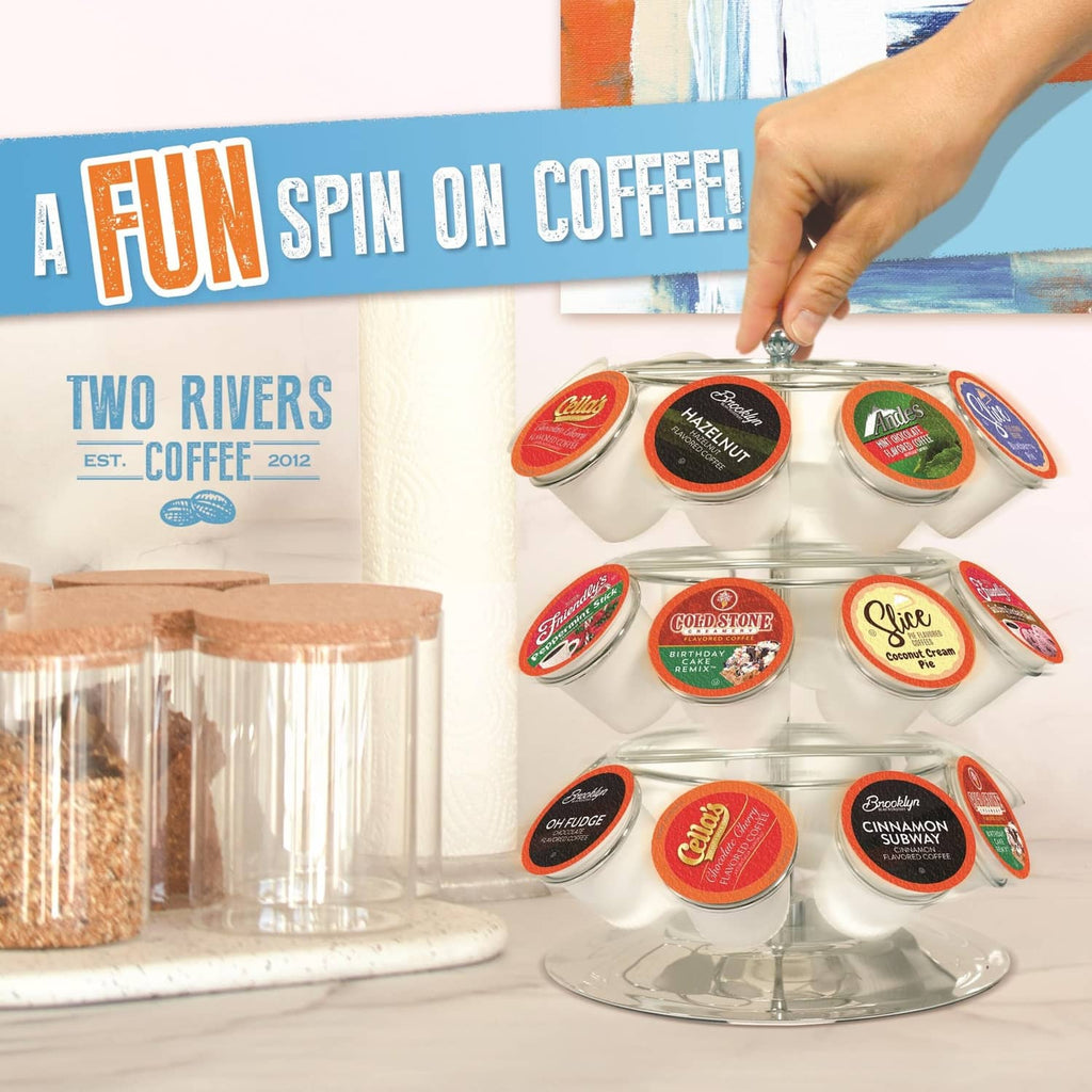 Pod carousel display with multiple labeled coffee pods on a spinning stand