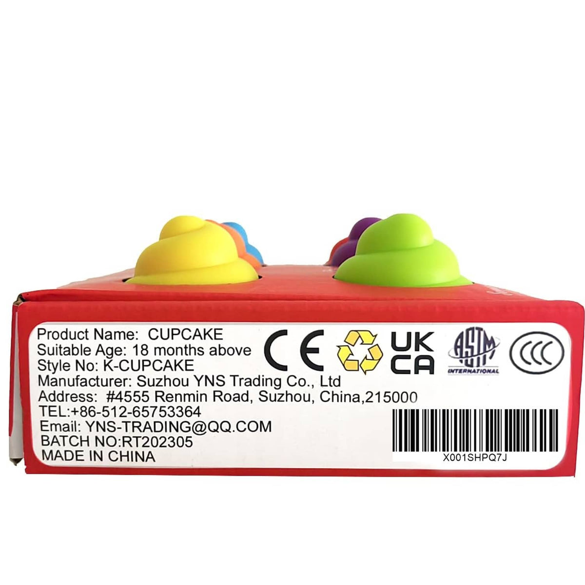 Rainbow cupcake learning toy in red retail box packaging