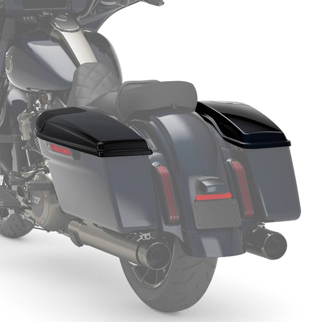 Installed black saddlebag speaker lids with mesh grilles on motorcycle side rear view