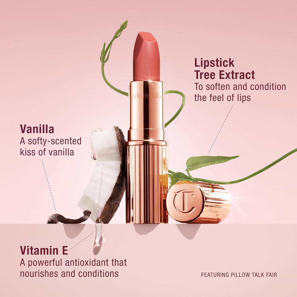 Rose-pink matte lipstick in rose-gold tube with bullet, next to vanilla pod and leaves