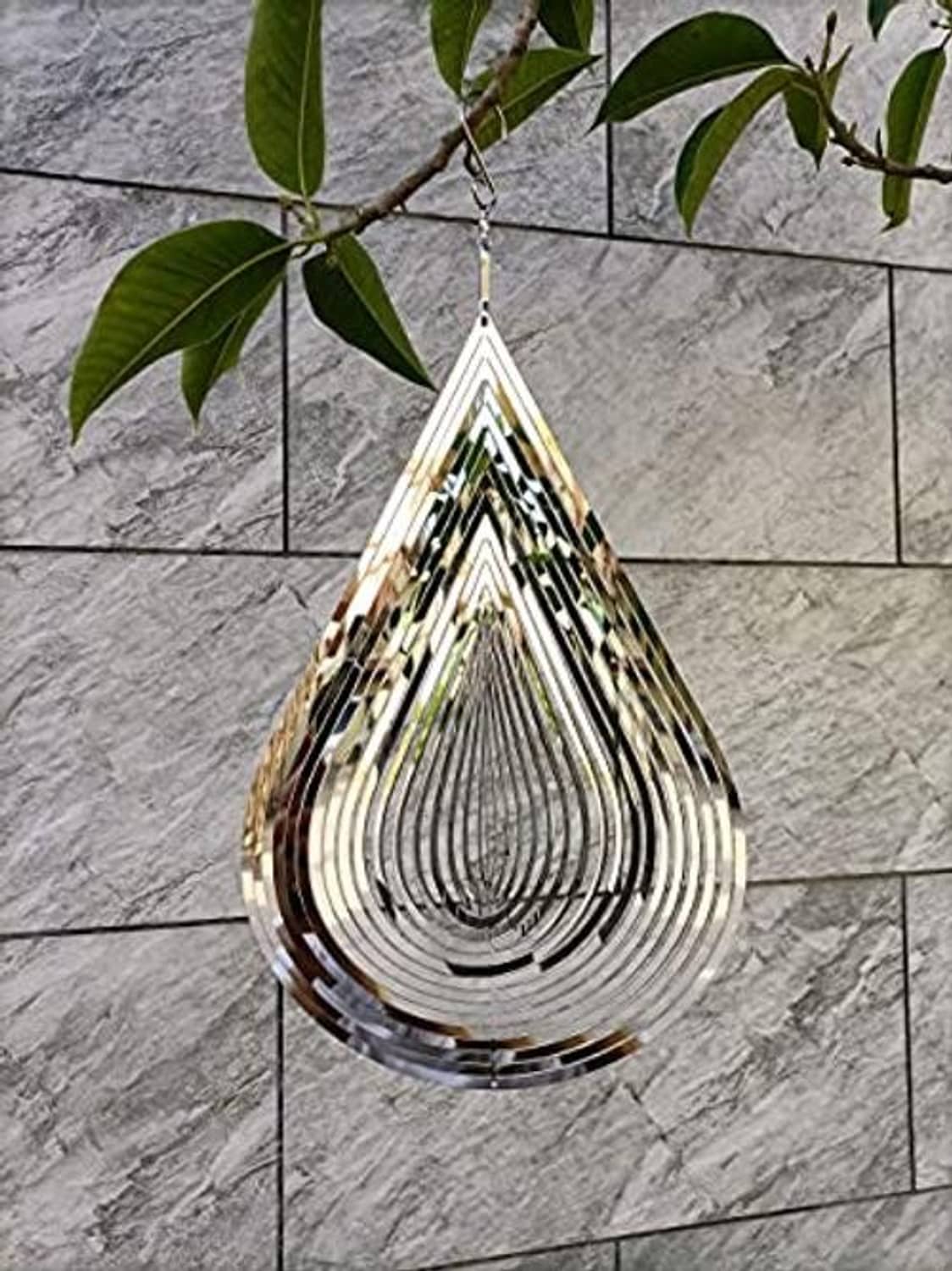 Hanging teardrop wind spinner with silver slats and dark outer spiral accents