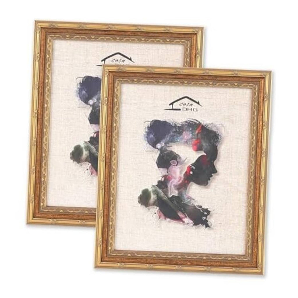 Two 11x14 vintage picture frames with gold-toned edges and printed portrait artwork