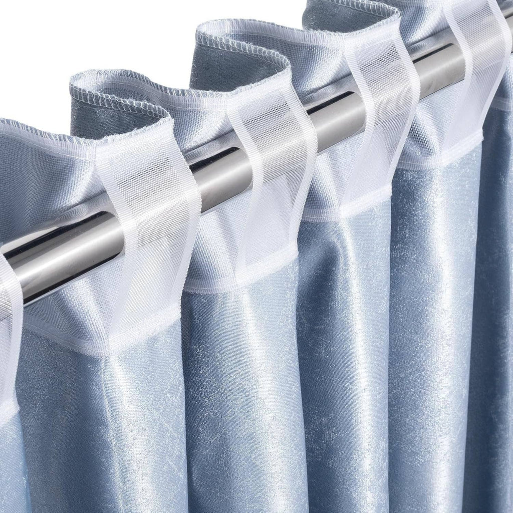 White translucent pleating tape detail showing parallel rows and folded sheer mesh