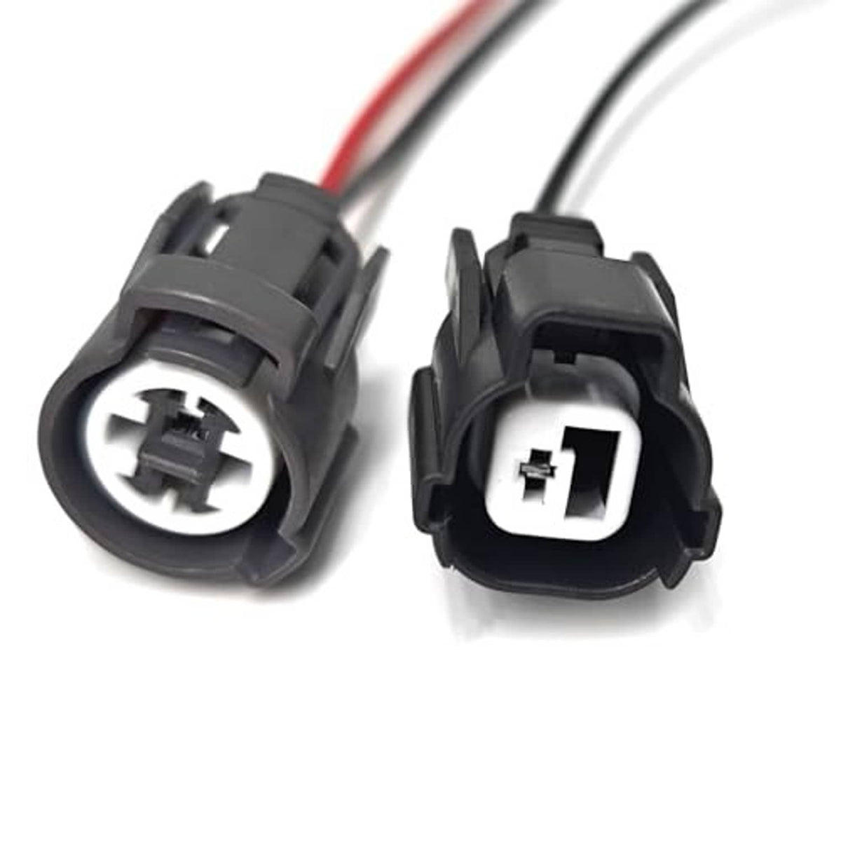 Oil pressure switch wire pigtail kit, close-up of two black electrical connectors