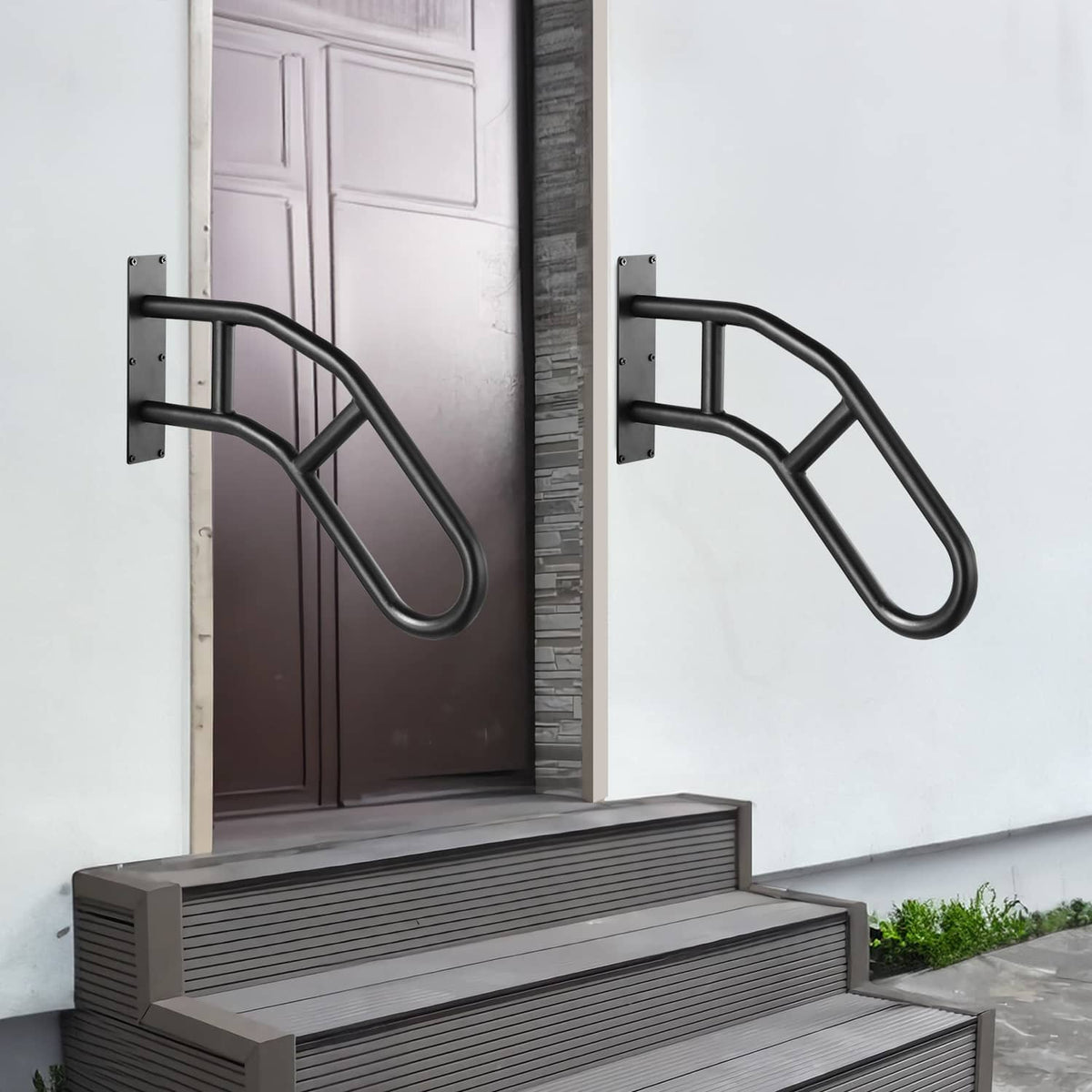 Matte black dual wall grab rails installed beside steps, with non-slip grips