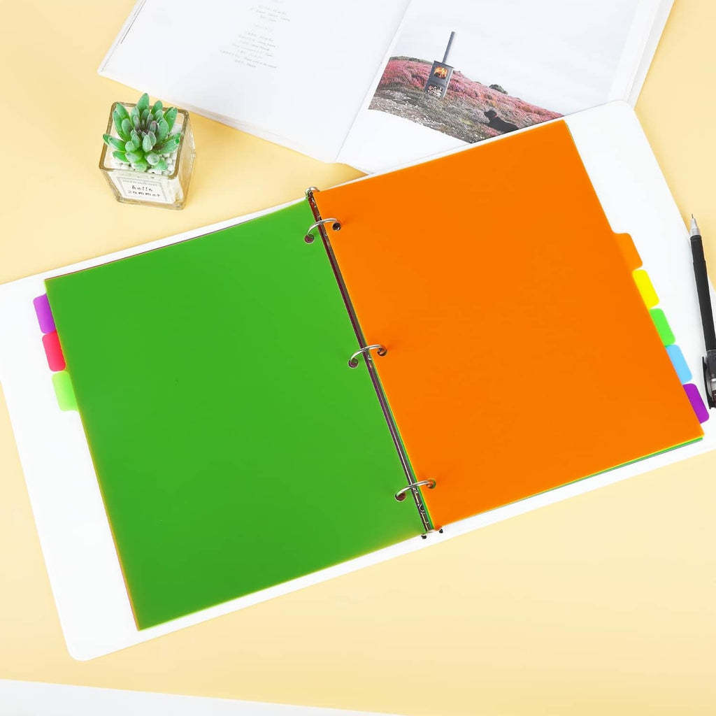 Open 3-ring binder with green and orange divider pages and colored tab dividers